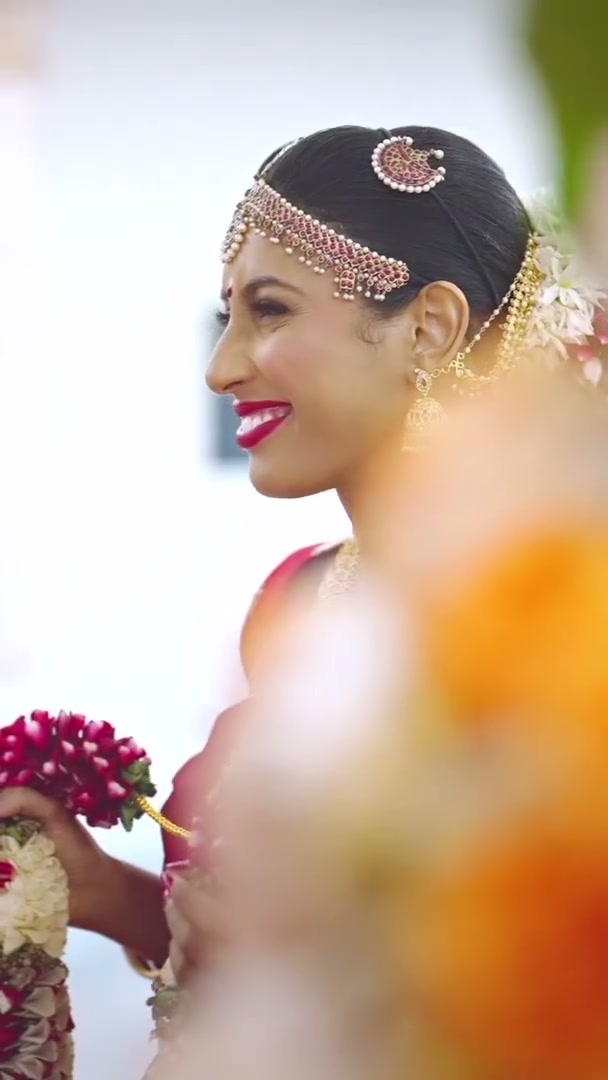 A bride laughing during her wedding